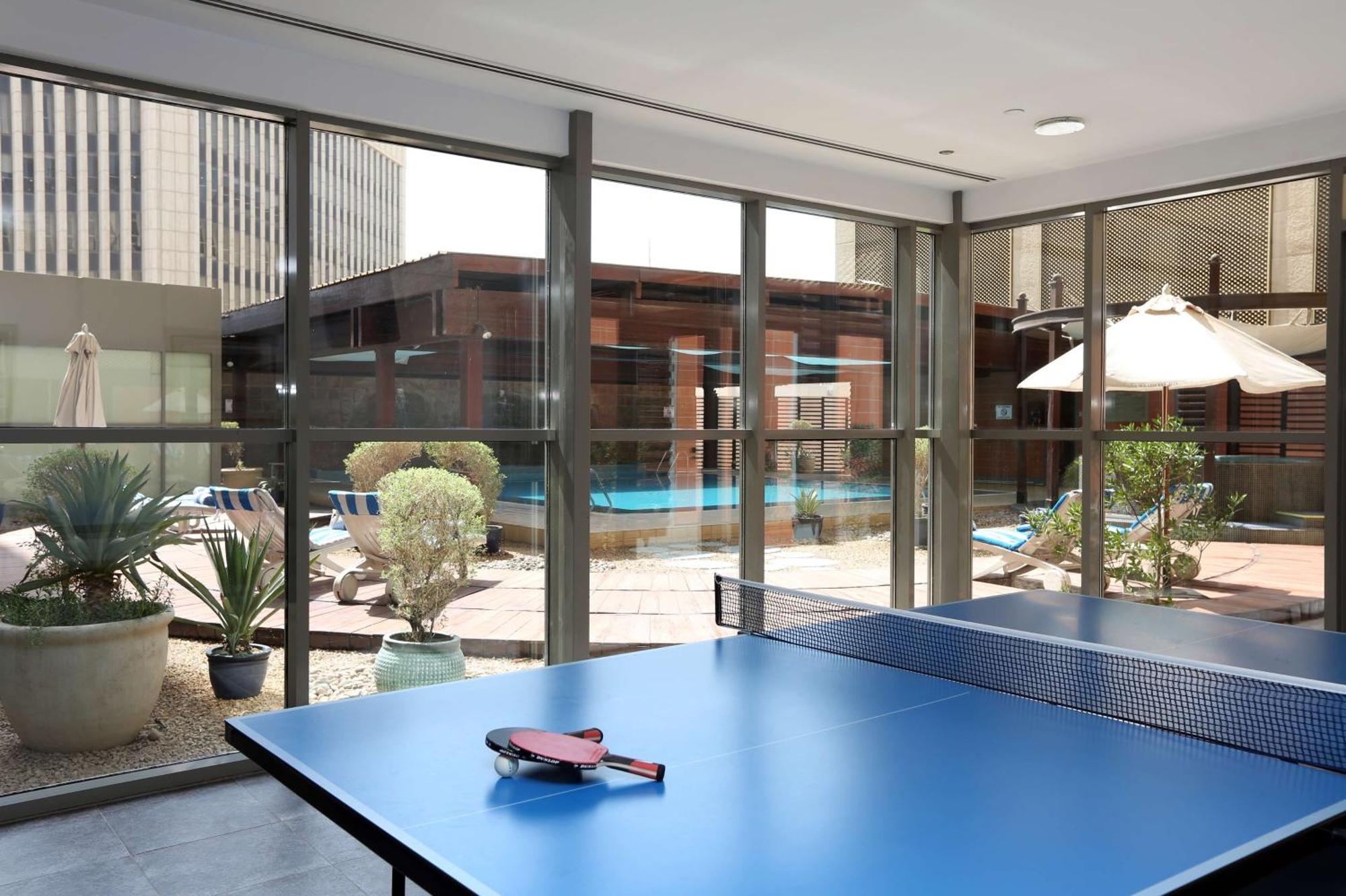 Radisson Blu Hotel, Riyadh Exterior photo The table tennis room